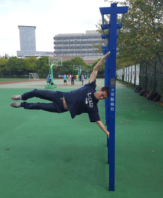 Doing a human flag exercise on campus